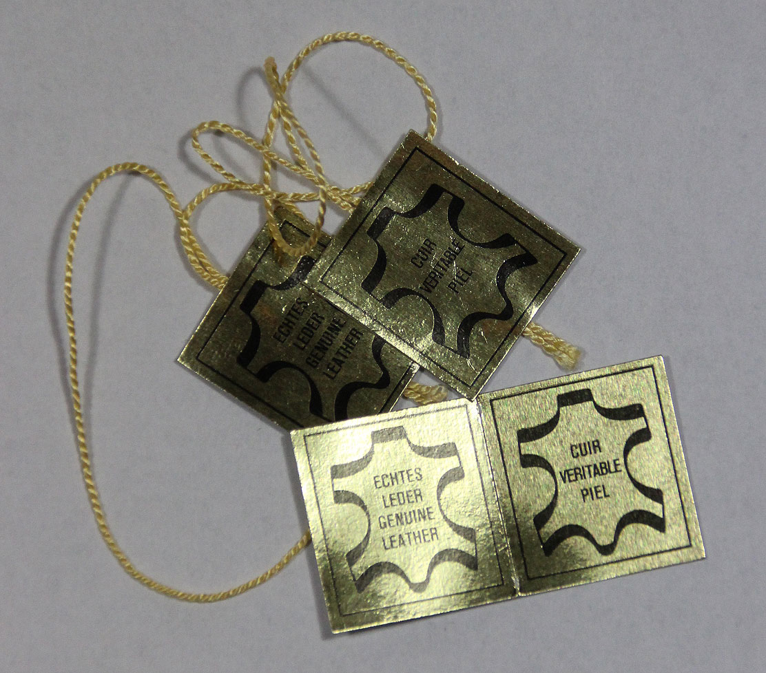 Anhänge Siegel "Echtes Leder" viersprachig, 20 x 22 mm