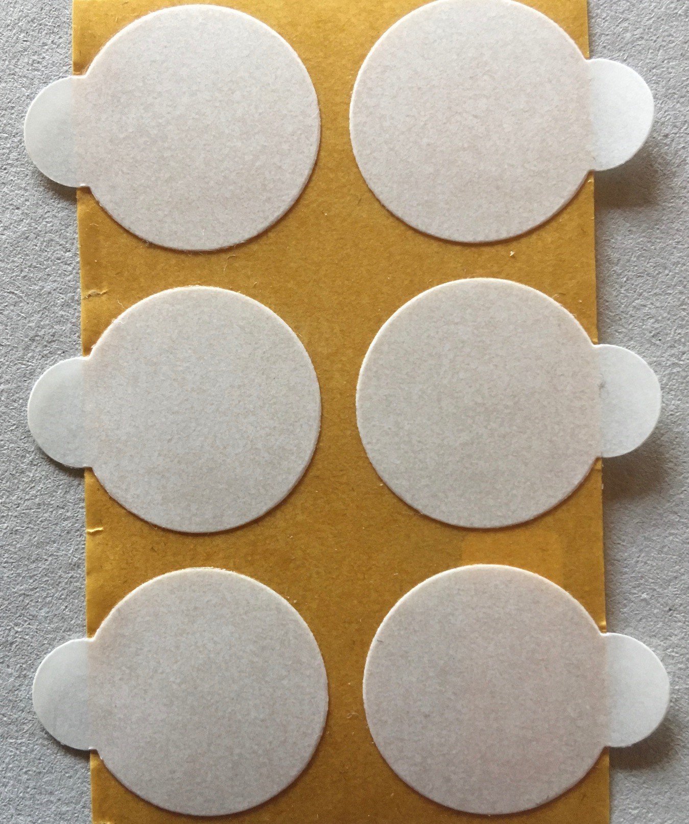 Doppelklebepunkte, 20 mm mit Anfasslasche
