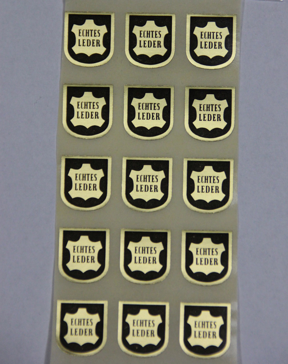 Haftetiketten "Echtes Leder", 14 x 16 mm, Rollen, Haftpapier gold